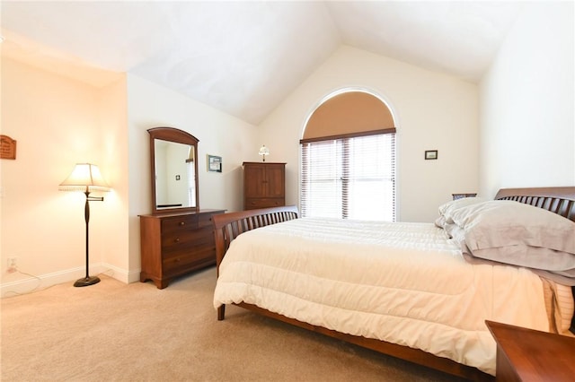 200 Roger Williams Ave Unit 106, East Providence, RI 02916 - bedroom with light colored carpet, lofted ceiling, and baseboards