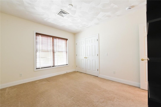 200 Roger Williams Ave Unit 106, East Providence, RI 02916 - unfurnished bedroom with light carpet and baseboards