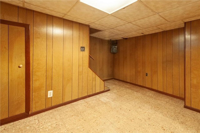 49 Gooding St, Pawtucket, RI 02860 - finished below grade area featuring a drop ceiling, wood walls, and baseboards
