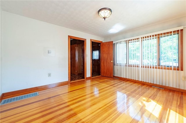 49 Gooding St, Pawtucket, RI 02860 - empty room with hardwood / wood-style flooring and baseboards