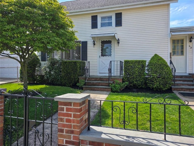 49 Gooding St, Pawtucket, RI 02860 - view of front facade featuring a gate