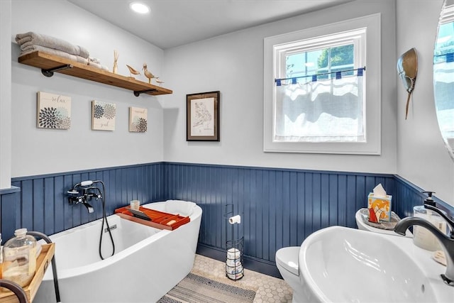 1 Fried Ave, Bristol, RI 02809 - full bath with a sink, wainscoting, a freestanding tub, recessed lighting, and toilet