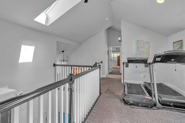 1 Fried Ave, Bristol, RI 02809 - workout area with carpet, a skylight, vaulted ceiling, baseboards, and a chandelier