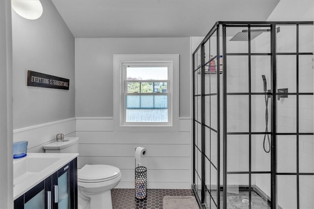 1 Fried Ave, Bristol, RI 02809 - bathroom featuring a shower stall, a wainscoted wall, toilet, vanity, and tile patterned floors