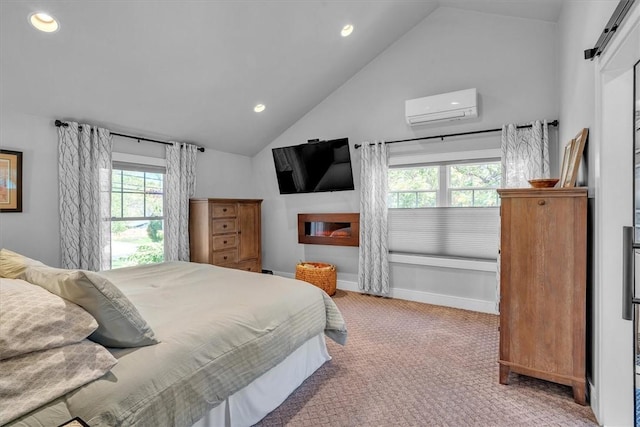 1 Fried Ave, Bristol, RI 02809 - carpeted bedroom with a wall mounted AC, multiple windows, recessed lighting, high vaulted ceiling, and a barn door
