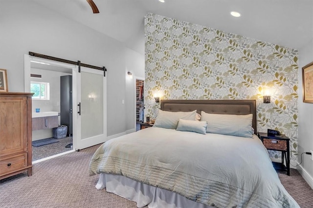 1 Fried Ave, Bristol, RI 02809 - carpeted bedroom with wallpapered walls, a barn door, baseboards, recessed lighting, and ensuite bathroom