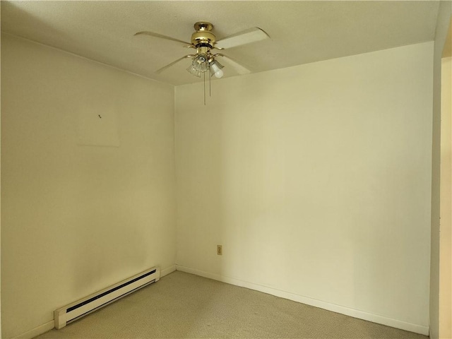 29 School St Unit 12E, Westerly, RI 02891 - unfurnished room featuring a baseboard heating unit, ceiling fan, and light colored carpet