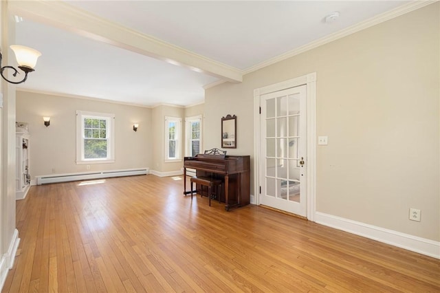 110 Narragansett Ave W, South Kingstown, RI 02879 - foyer entrance with baseboard heating, light wood-style floors, crown molding, baseboards, and a chandelier