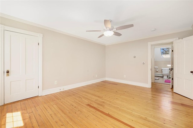 110 Narragansett Ave W, South Kingstown, RI 02879 - unfurnished room featuring a baseboard radiator, light wood-type flooring, a ceiling fan, crown molding, and baseboards