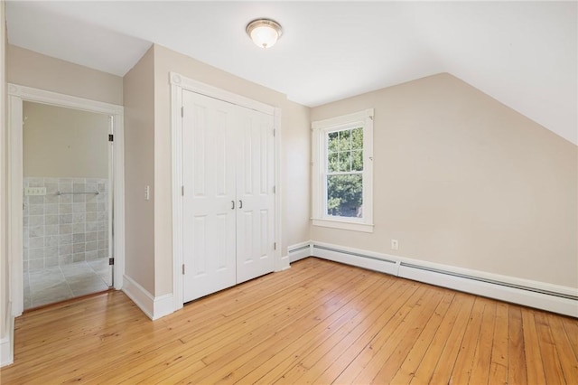 110 Narragansett Ave W, South Kingstown, RI 02879 - bonus room featuring light wood-type flooring, a baseboard radiator, lofted ceiling, and baseboards