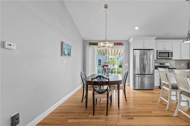 9 Thelma Ln, Middletown, RI 02842 - dining space featuring a chandelier, light wood-style flooring, baseboards, lofted ceiling, and recessed lighting