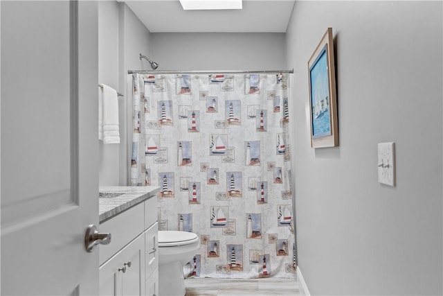 9 Thelma Ln, Middletown, RI 02842 - full bathroom with toilet, a shower with shower curtain, vanity, and wood finished floors