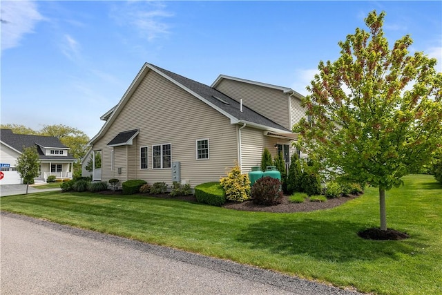 9 Thelma Ln, Middletown, RI 02842 - view of home's exterior with a yard