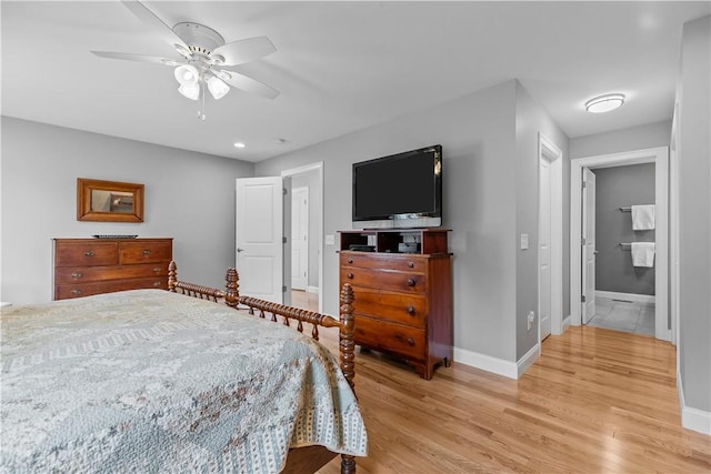 9 Thelma Ln, Middletown, RI 02842 - bedroom featuring baseboards, light wood finished floors, ceiling fan, and ensuite bath