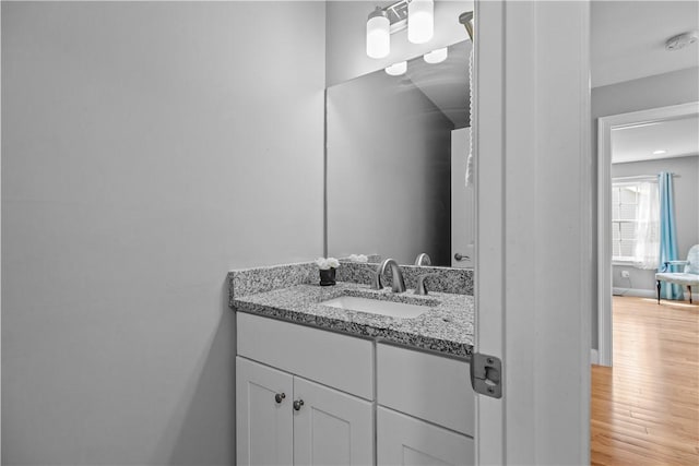 9 Thelma Ln, Middletown, RI 02842 - bathroom with wood finished floors and vanity