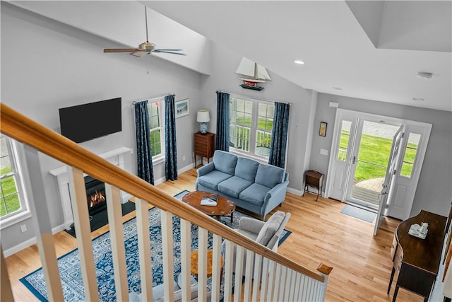 9 Thelma Ln, Middletown, RI 02842 - living room with healthy amount of natural light, light wood-style floors, lofted ceiling, and recessed lighting