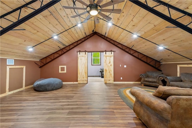 additional living space with baseboards, wood finished floors, ceiling fan, wooden ceiling, and vaulted ceiling