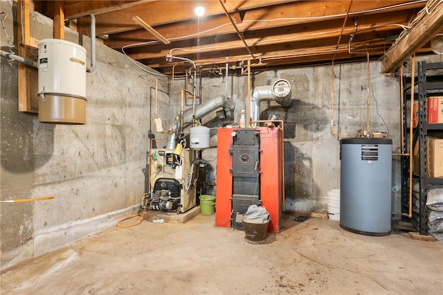 utility room featuring water heater, a heating unit, and a central vacuum unit