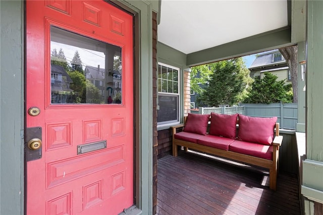 3 Hidden St, Providence, RI 02906 - doorway to property featuring a porch, outdoor lounge area, and fence