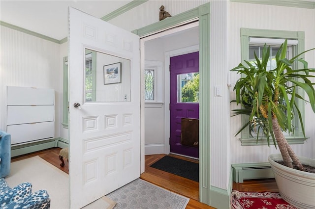 3 Hidden St, Providence, RI 02906 - foyer entrance with baseboard heating, crown molding, and wood finished floors
