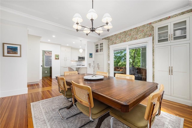 3 Hidden St, Providence, RI 02906 - dining space featuring a chandelier, crown molding, baseboards, light wood-style flooring, and recessed lighting