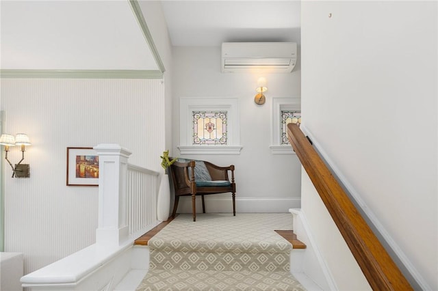 3 Hidden St, Providence, RI 02906 - staircase featuring a wall mounted AC and baseboards