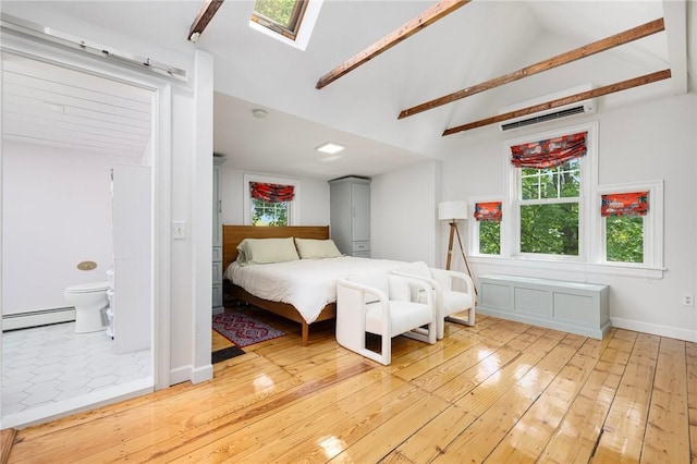 3 Hidden St, Providence, RI 02906 - bedroom featuring light wood-style flooring, a baseboard radiator, multiple windows, a skylight, and high vaulted ceiling