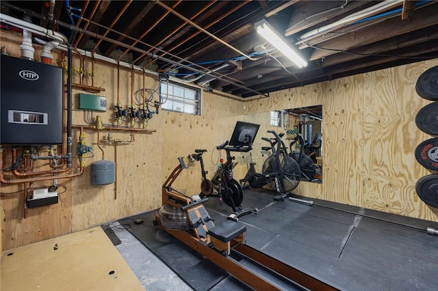 3 Hidden St, Providence, RI 02906 - workout room featuring water heater and wood walls