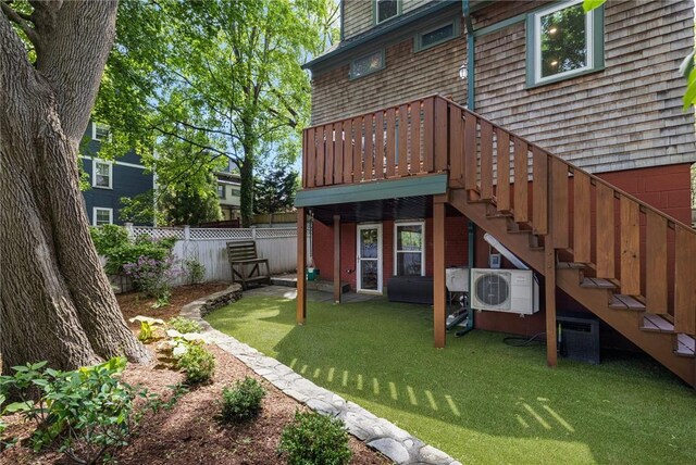 3 Hidden St, Providence, RI 02906 - back of property featuring ac unit, a wooden deck, and stairway