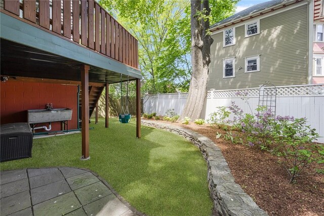 3 Hidden St, Providence, RI 02906 - view of yard featuring a wooden deck and stairway
