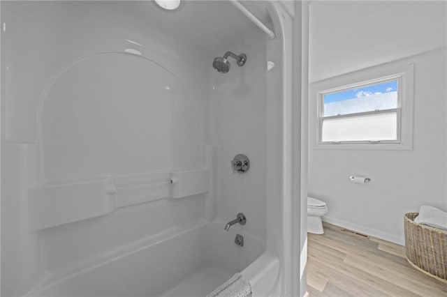 419 Atlantic Ave, Westerly, RI 02891 - bathroom with toilet, bathtub / shower combination, wood finished floors, and baseboards