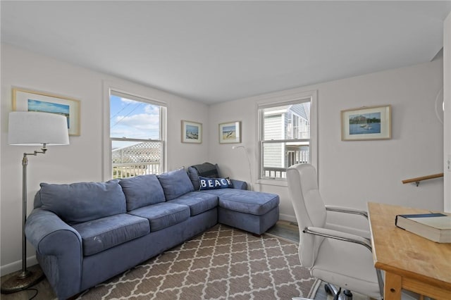 419 Atlantic Ave, Westerly, RI 02891 - living area featuring plenty of natural light, baseboards, and wood finished floors