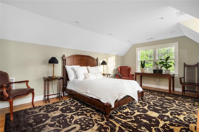 136 Adams Point Rd, Barrington, RI 02806 - bedroom featuring lofted ceiling, wood finished floors, and baseboards