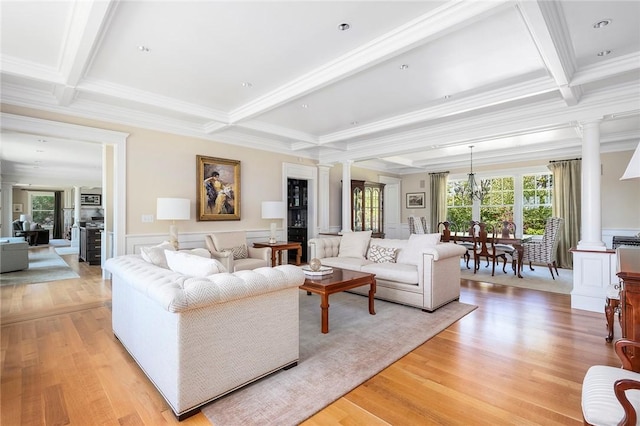 136 Adams Point Rd, Barrington, RI 02806 - living room with decorative columns, beamed ceiling, light wood-type flooring, ornamental molding, and coffered ceiling