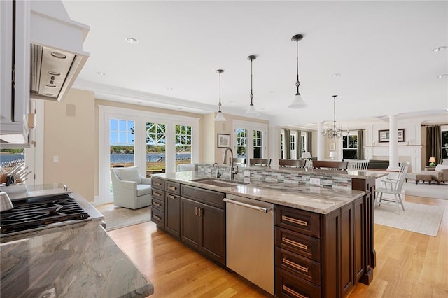 136 Adams Point Rd, Barrington, RI 02806 - kitchen featuring a sink, dishwasher, open floor plan, and dark brown cabinets