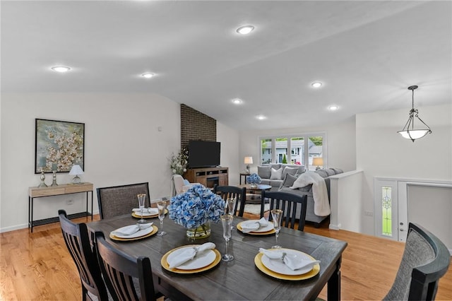 23 Watercress Ct, Coventry, RI 02816 - dining area with vaulted ceiling, light wood finished floors, and recessed lighting