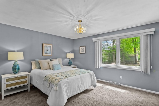 23 Watercress Ct, Coventry, RI 02816 - carpeted bedroom with a chandelier, multiple windows, and baseboards