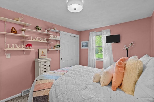 23 Watercress Ct, Coventry, RI 02816 - carpeted bedroom with baseboards and a closet