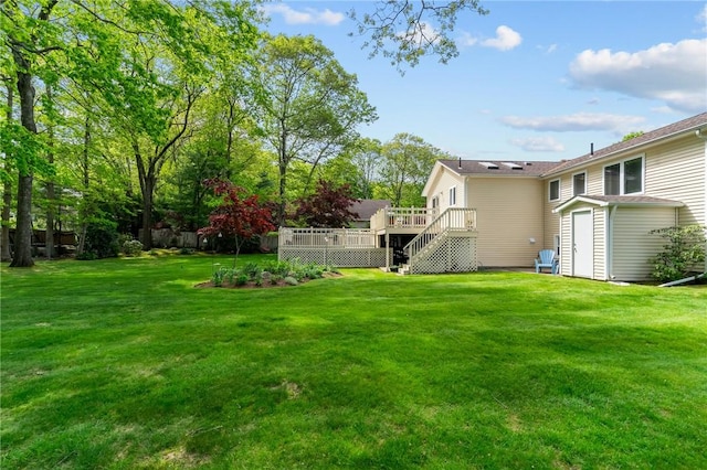 23 Watercress Ct, Coventry, RI 02816 - view of green lawn featuring a wooden deck and stairs