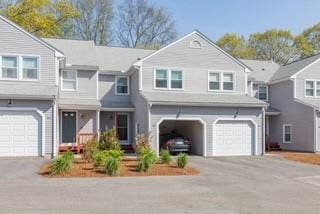 view of front of house with a garage and driveway