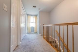 corridor featuring carpet