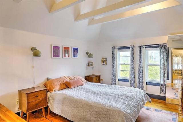 bedroom featuring wood finished floors