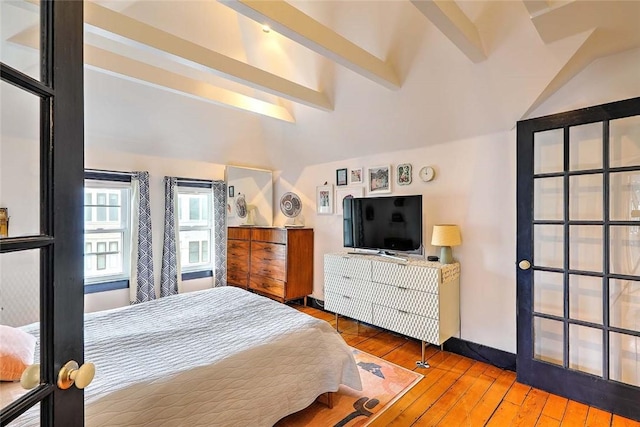 bedroom with hardwood / wood-style flooring