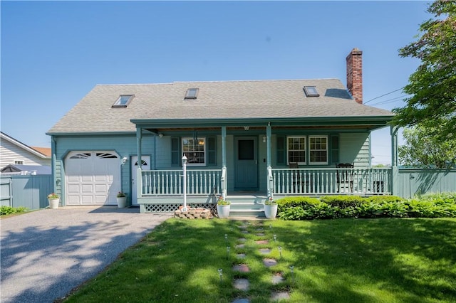 62 Vallette St, Cranston, RI 02920 - view of front of house featuring covered porch, a garage, driveway, and a shingled roof