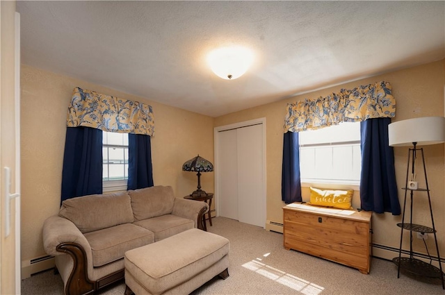 62 Vallette St, Cranston, RI 02920 - living room with baseboard heating and light carpet