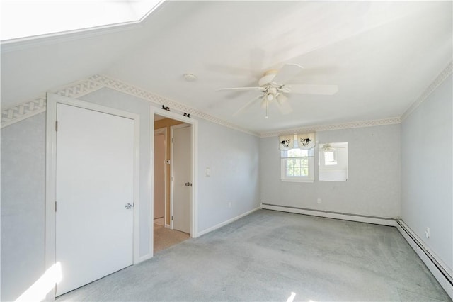 62 Vallette St, Cranston, RI 02920 - spare room with carpet floors, a baseboard radiator, a ceiling fan, and baseboards