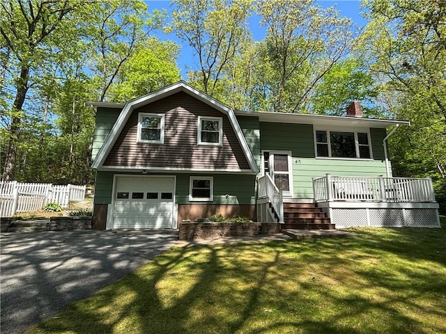 9 Sky View Rd, North Smithfield, RI 02896 - view of front facade with a garage, asphalt driveway, a chimney, and a wooden deck