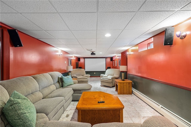 101 Nancy Ln, Burrillville, RI 02830 - cinema room with a baseboard heating unit, a paneled ceiling, recessed lighting, and baseboards