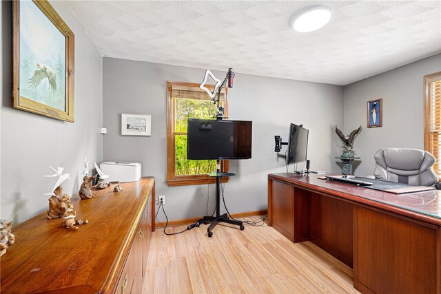 101 Nancy Ln, Burrillville, RI 02830 - home office with light wood-style floors and baseboards