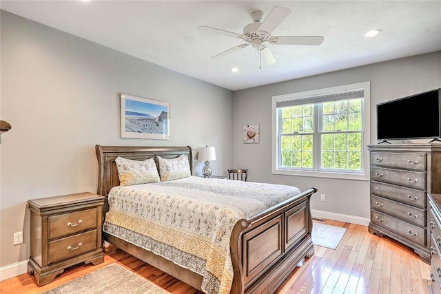 bedroom featuring baseboards, light wood-style flooring, recessed lighting, and ceiling fan